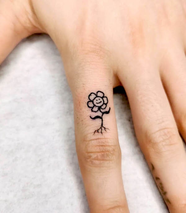 Tatuaj dragut de mana cu floare care danseaza de @oeltattoo